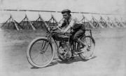 Great uncle Perry Powell. The Powell brothers ran a motorcycle shop in Grand Island, Nebraska around 1910 to 1915. On this photo from 1915 Perry is getting ready for a test run on one of their racing Flying Merkel\'s. By courtesy of Bob Powell, Oregon City, OR; Great grandson of Walter Powell, one of the Powell Brothers.